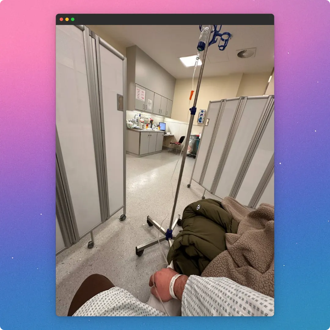 View from a hospital bed in the emergency room, with an IV drip